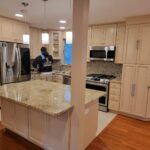 Modernized kitchen with new fixtured being finished by La Clave
