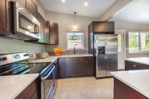  Refinishing Cabinets in kitchen for stainless steel appliances